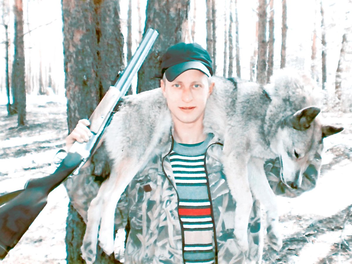 Андрей-Ладугин-охотник-волк